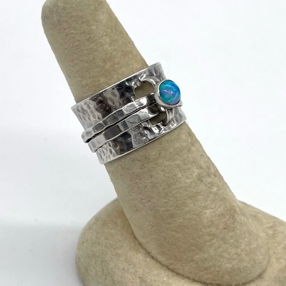 Silpada 925 Hammered Sterling Silver Spinner Ring with Faux Opal accent